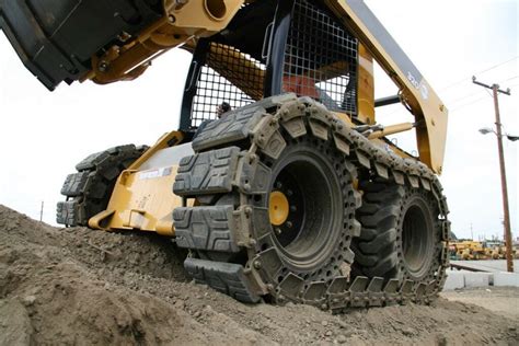 skid steer tracks vs tires snow|best tracked skid steer.